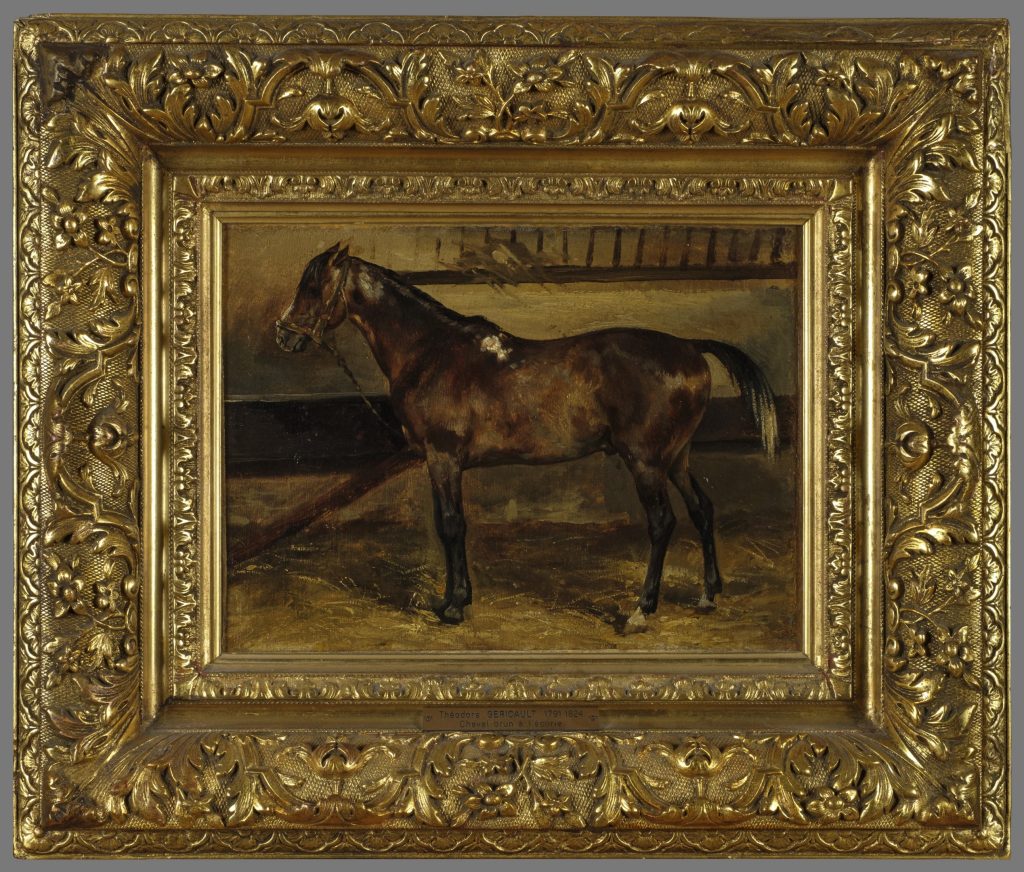 Cheval brun à l'écurie