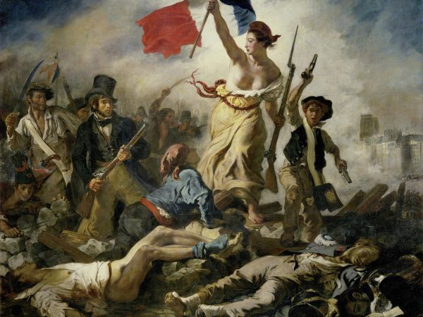 Allegorical Liberty holding a flag above fighters at a Paris barricade