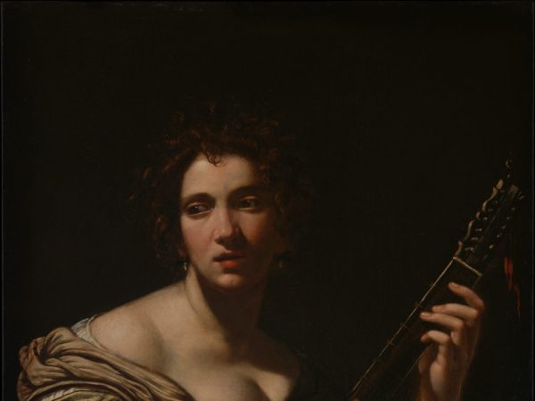 woman-playing-a-guitar