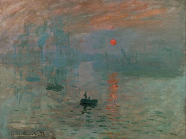 Hazy orange sun over misty harbour water with small boats